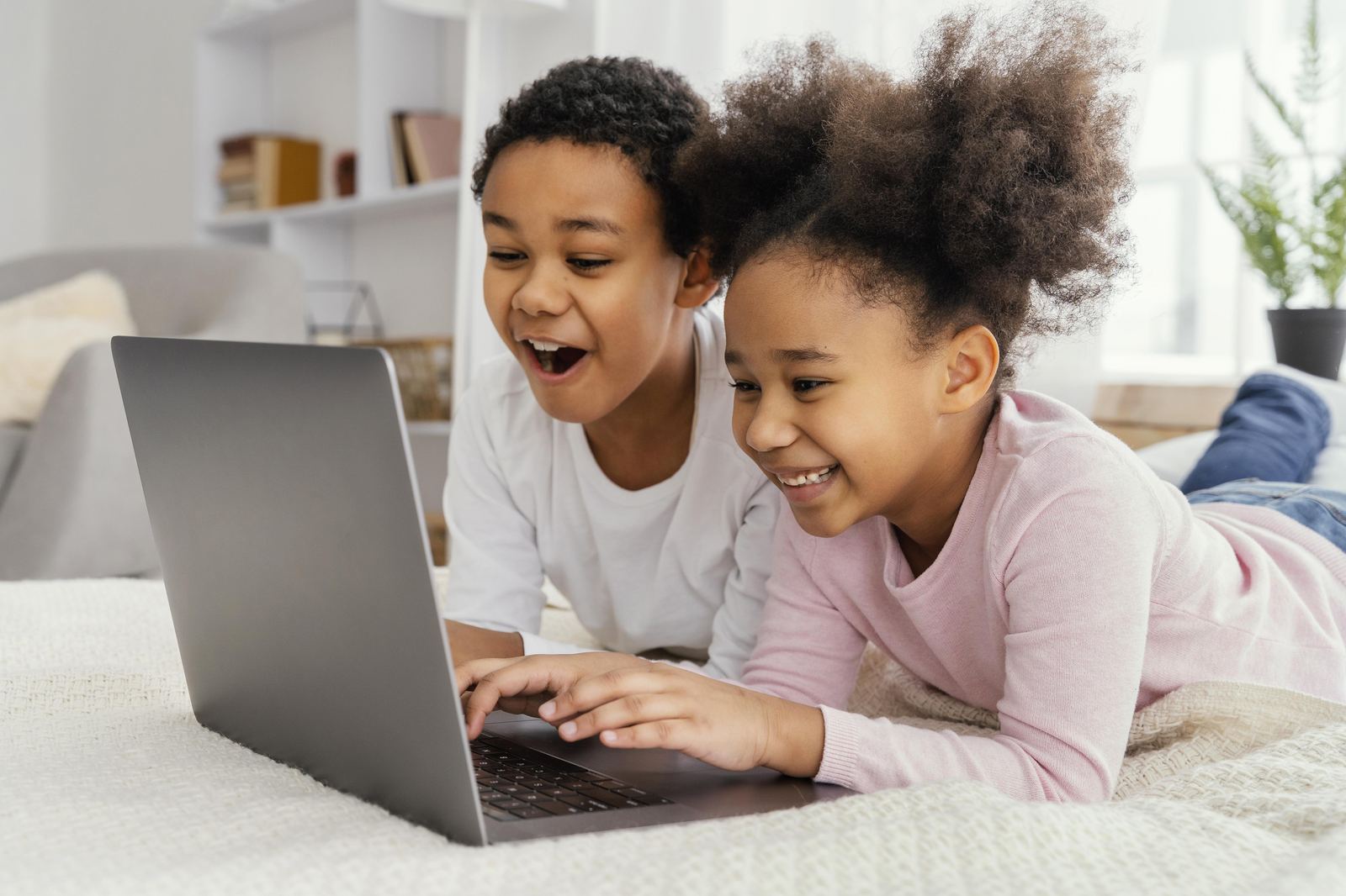 Learners using a laptop together